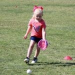 girl trying to catch a ball