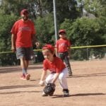 kid catching a baseball