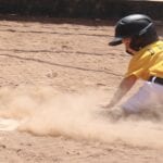 baseball player on a dusty surface